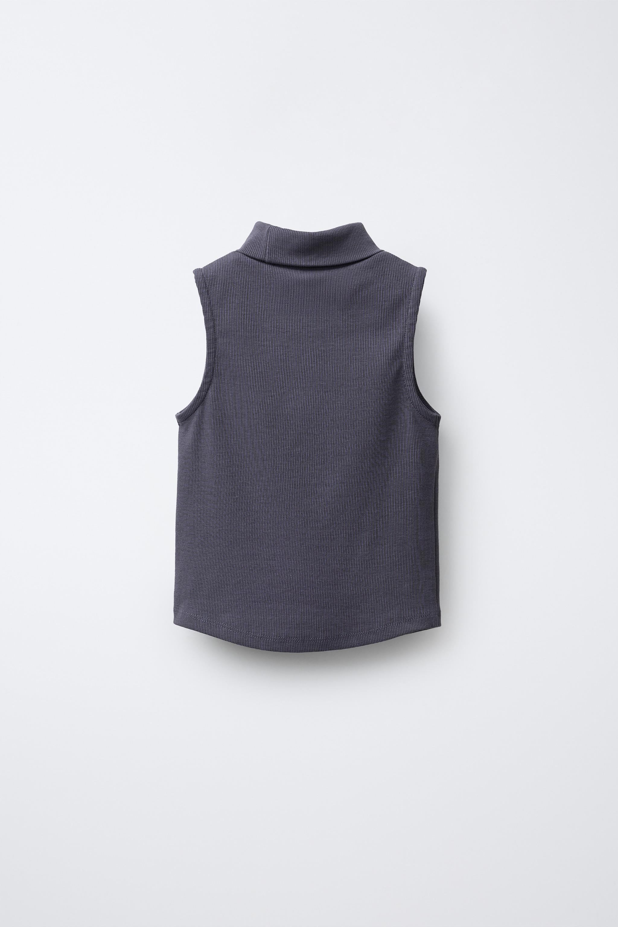 RIBBED TURTLENECK T-SHIRT WITH STAR STUDS